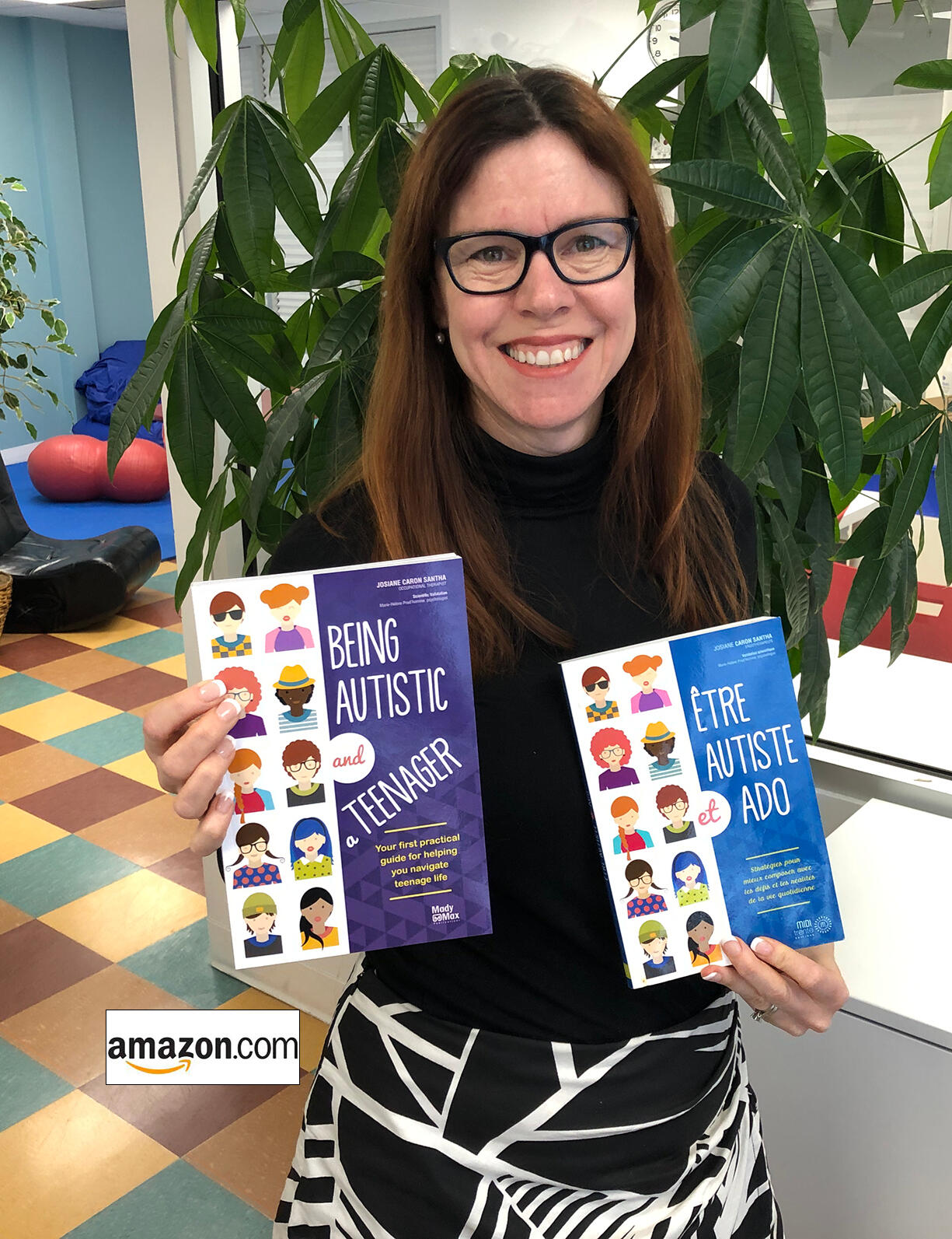 Author holding two books